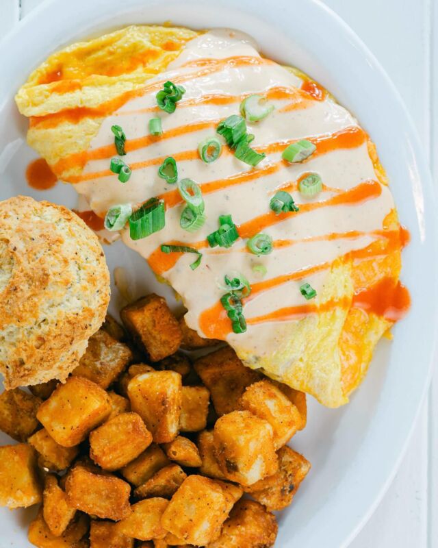 Hey there, spicy food fans! 🌶️ Get your taste buds tingling with our Buffalo Chicken Omelet. It’s packed with juicy pulled chicken, cream cheese, and melted cheddar jack, all topped with buffalo ranch sauce and fresh green onions. Want a protein boost? Swap for egg whites at no extra cost! 

Order online or visit us in store at a Wild Eggs near you.