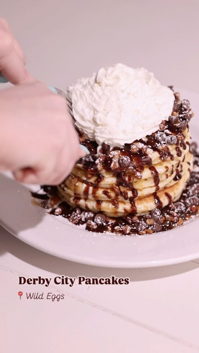 Avail until May 5th only at select locations in Louisville / Southern Indiana — our very own Derby City Pancakes! 🥞 Fluffy stacks topped with candied pecans, chocolate, caramel, whipped cream and powdered sugar. Guests can try our limited “Spring Into Derby” menu exclusively at Wild Eggs in Downtown Louisville, St. Matthews, Jeffersontown, Middletown, Westport Village, Jeffersonville and New Albany. See website for nearest Wild Eggs location 🐎