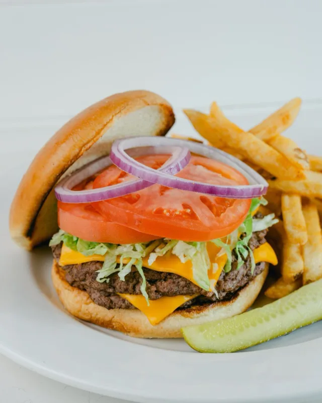 Who says brunch can’t be a little beefy? 🍔 Celebrate National Hamburger Day with our juicy Classic Burger. The perfect choice for your midday cravings! #StayWild