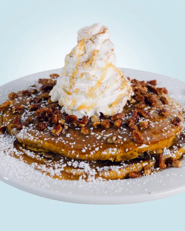 They're back! 🎃 Our famous Pumpkin Pie Pancakes have returned. These sweet pumpkin stacks are topped with whipped cream, caramel sauce, candied pecans, powdered sugar and cinnamon. Perfect to share with friends or get a personal stack to enjoy. 

Order them your way: 
•Full Stack 
•Gluten-Free (+1.49)
•Single Side Pancake if you just want a taste!

Pair with a Pumpkin Spiced Latte or sip on a Caramel Apple Mimosa now at Wild Eggs! Visit wildeggs.com to place your order for pick-up or delivery or find a location near you.